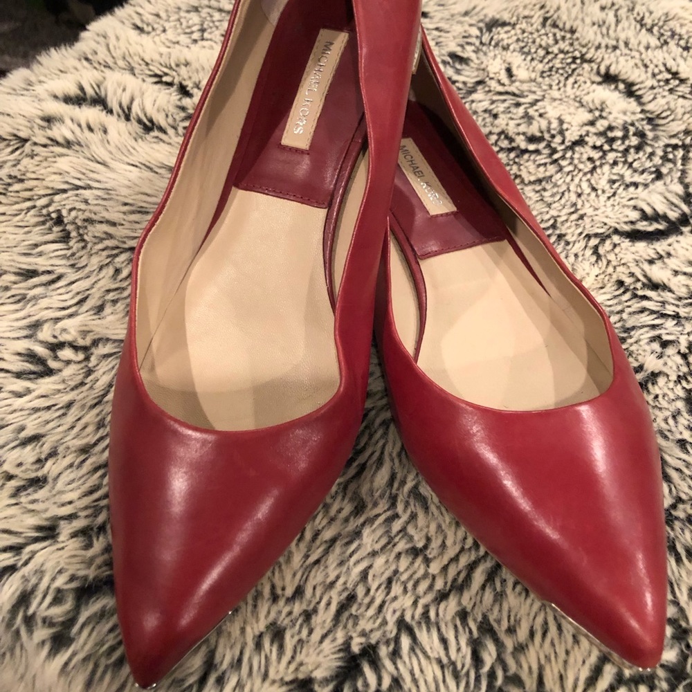 Red flats by Micheal Kors